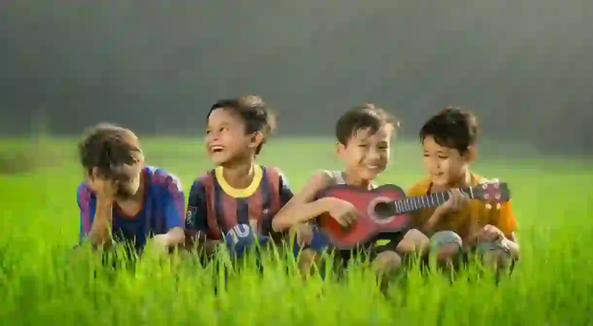 Children playing the ukulele