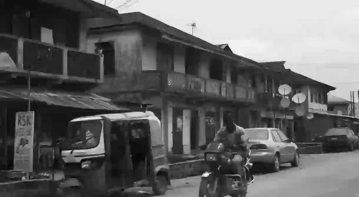 A man riding a motor bike in Sapele, Nigeria