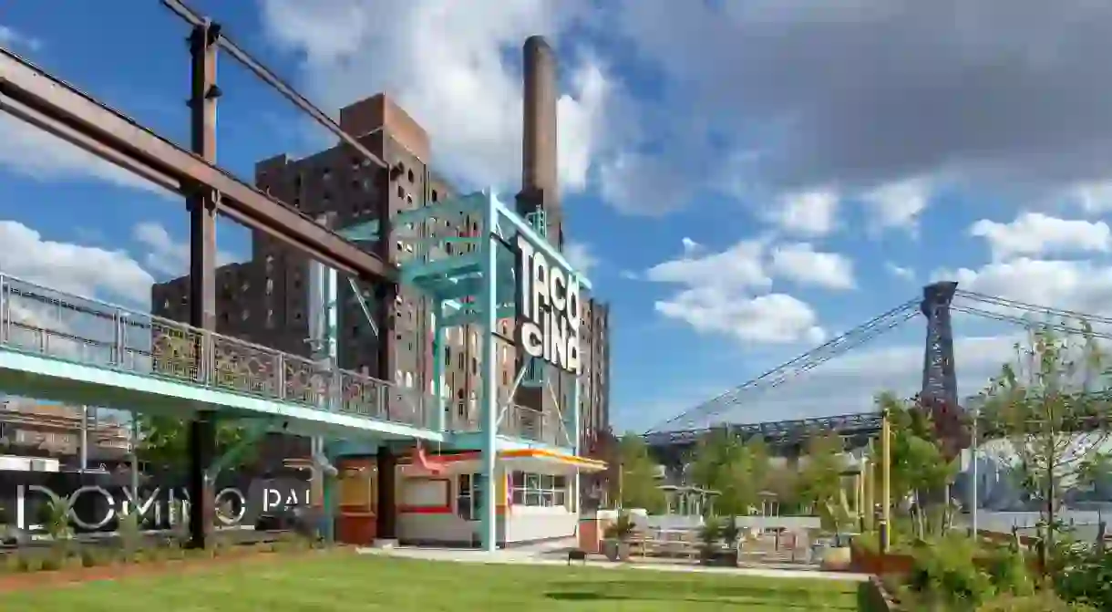 Tacocina and open grass area at Domino Park