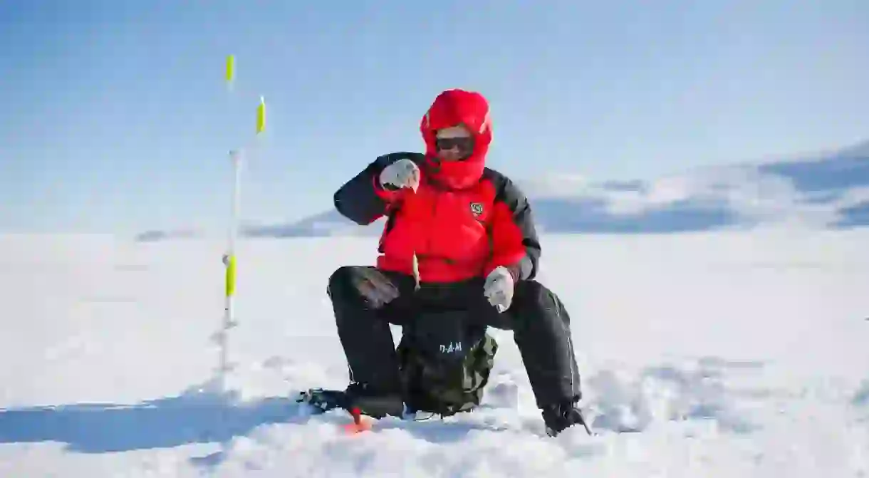 Ice hole fishing in Finland is meditation on ice