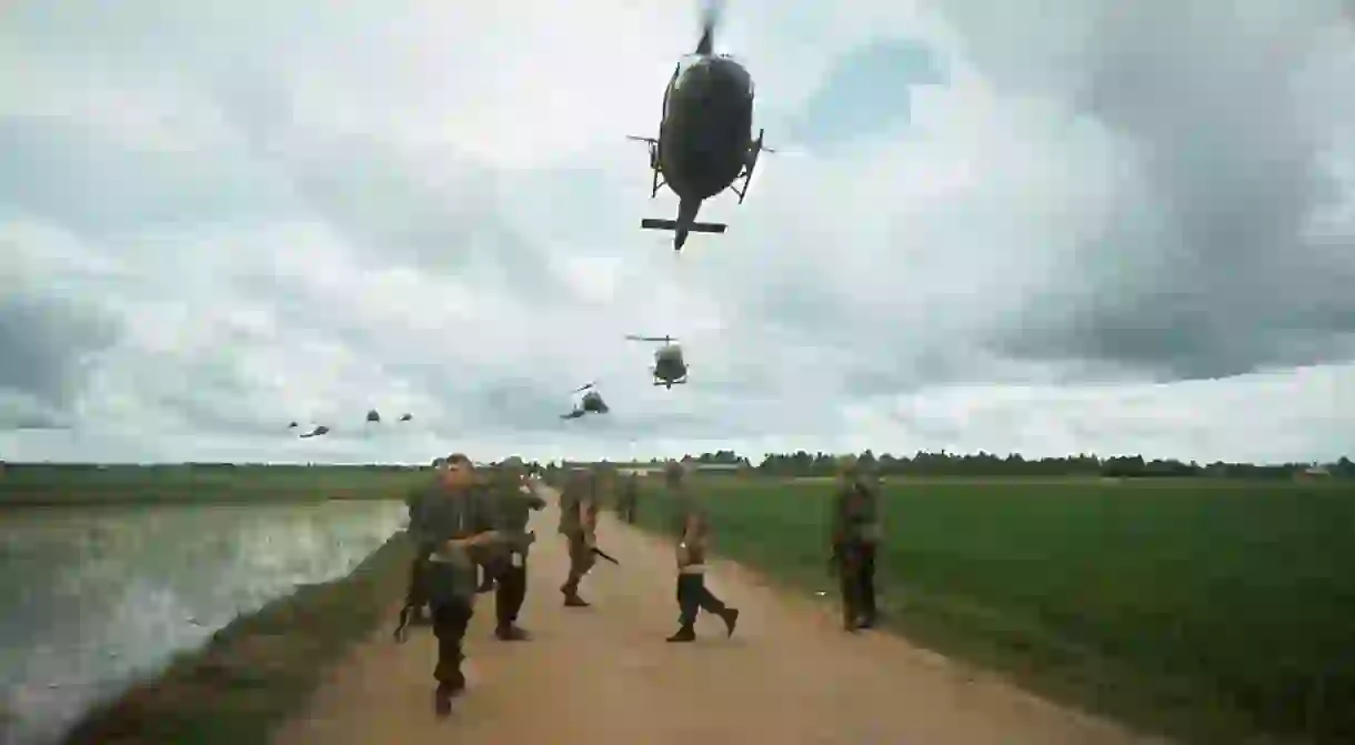 American troops awaiting helicopter transport south of Saigon, 1968