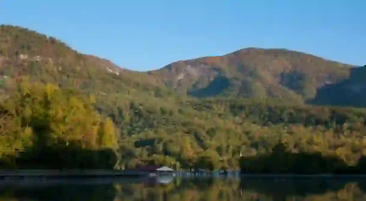 Fall colors on the water at Lake Lure in Western North Carolina