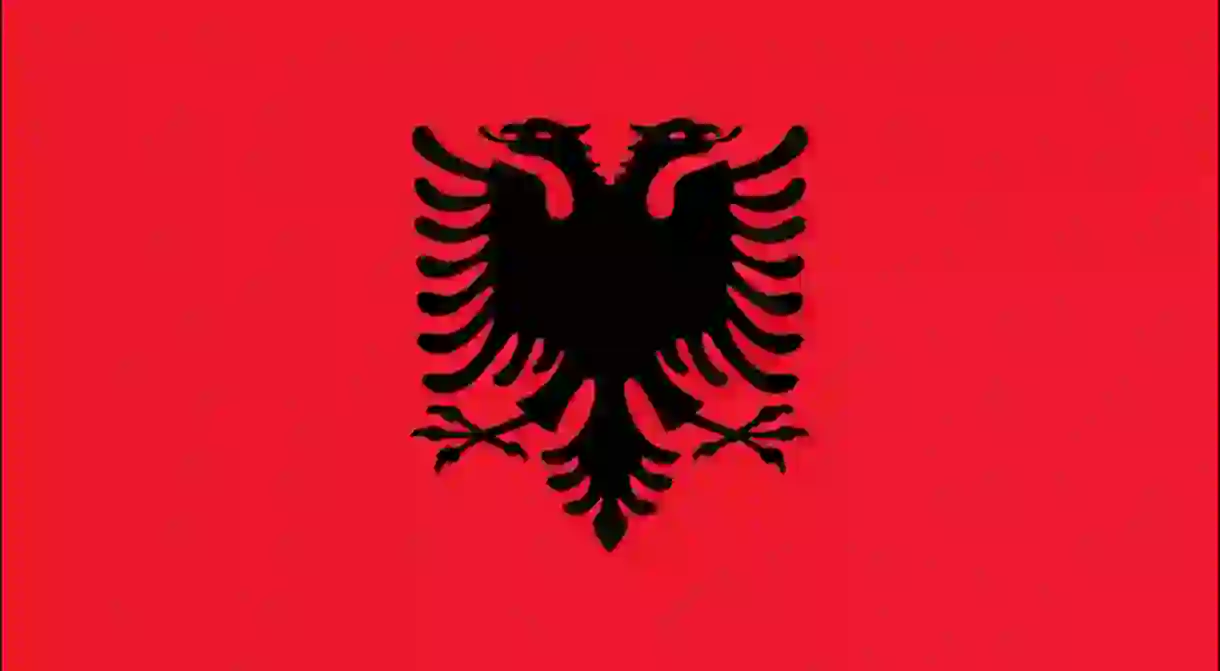 The Albanian flag with the double headed eagle