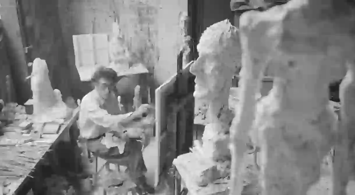 Alberto Giacometti painting in his Paris studio, 1958