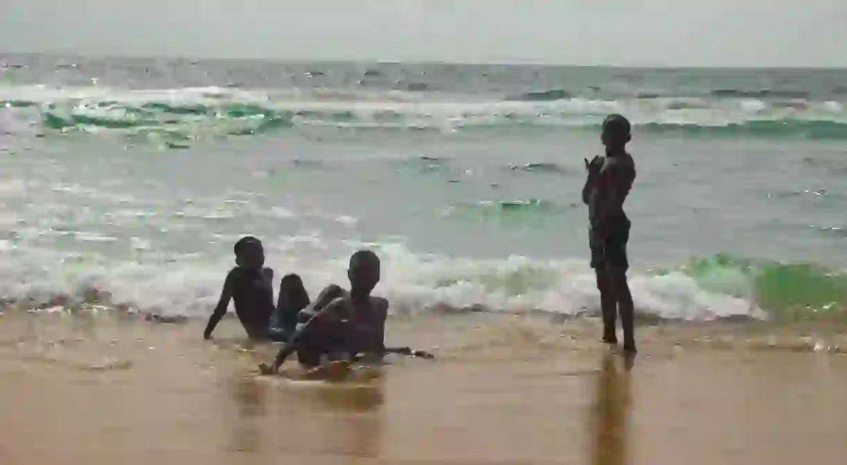 Children swimming at a beach