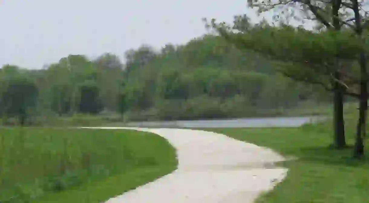 Running trail circling Patterson Lake in Oakhurst Forest Preserve, Aurora, Illinois