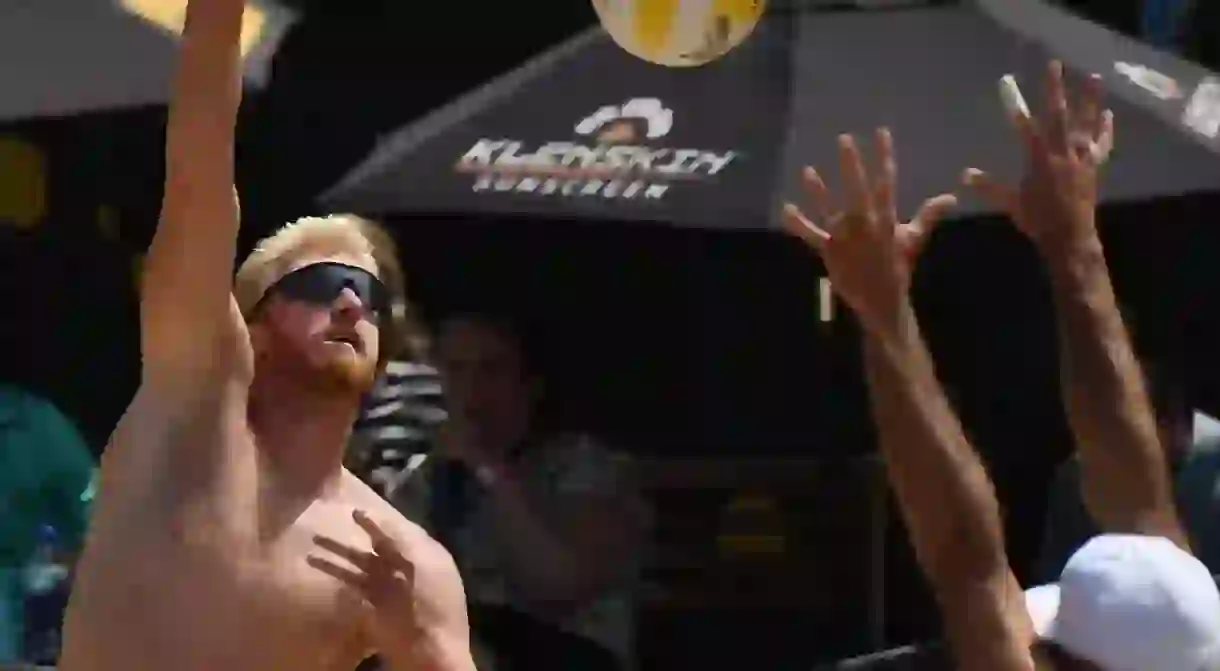 Chase Budinger (left) spikes the ball