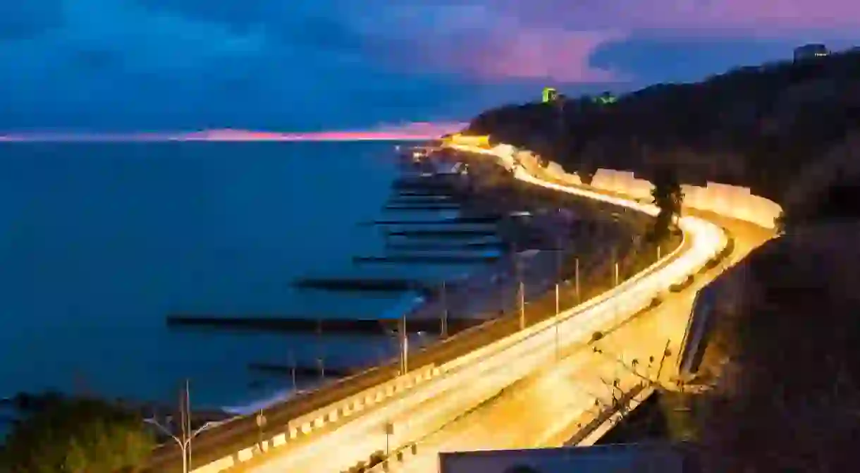 View of the sea and Kurortny Prospekt with light trails, Sochi, Russia