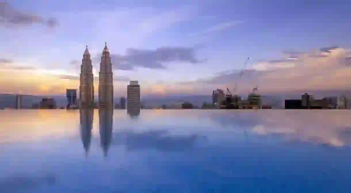 Reflection of Kuala Lumpur Twin Tower by the poolside