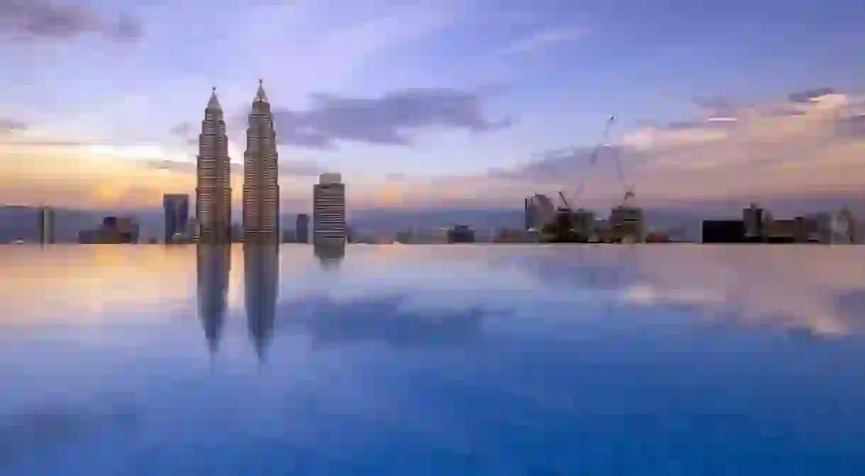 Reflection of Kuala Lumpur Twin Tower by the poolside