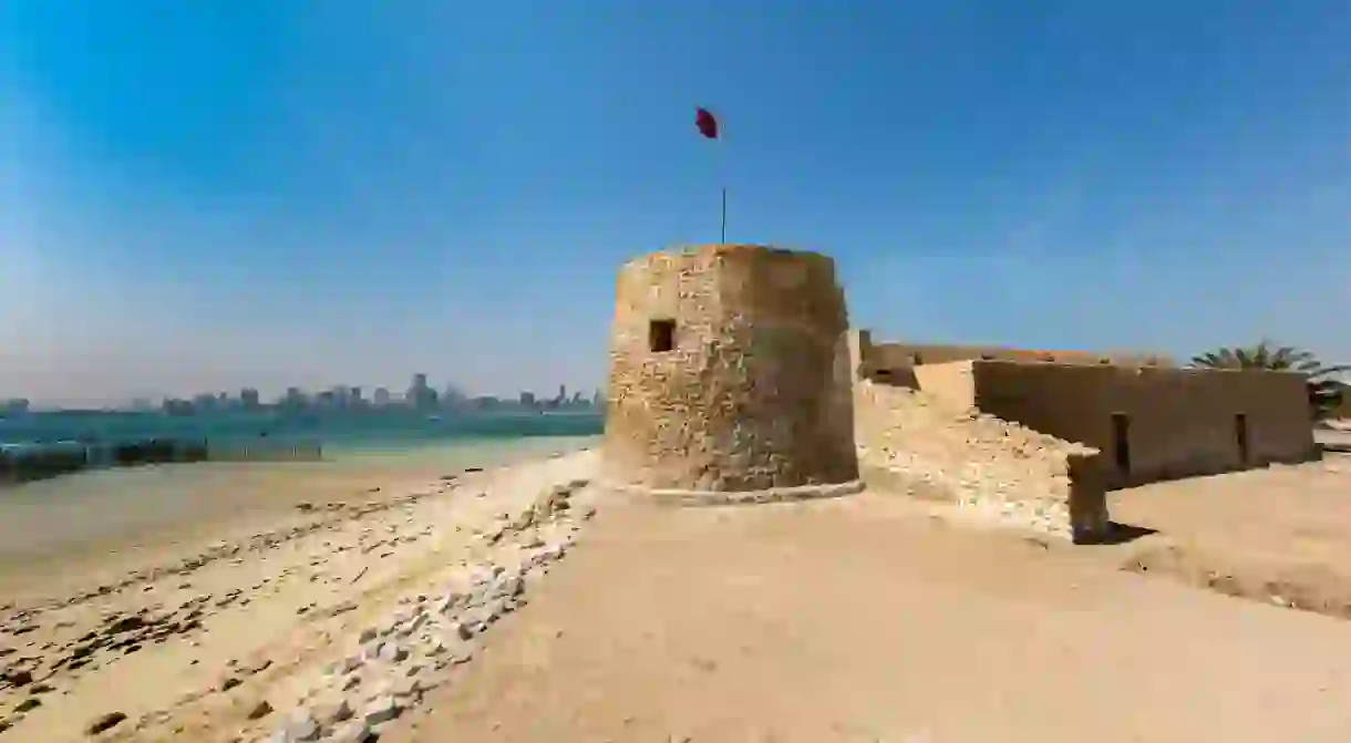 Bu Maher Fort in Arad with the beach and view of Manama city