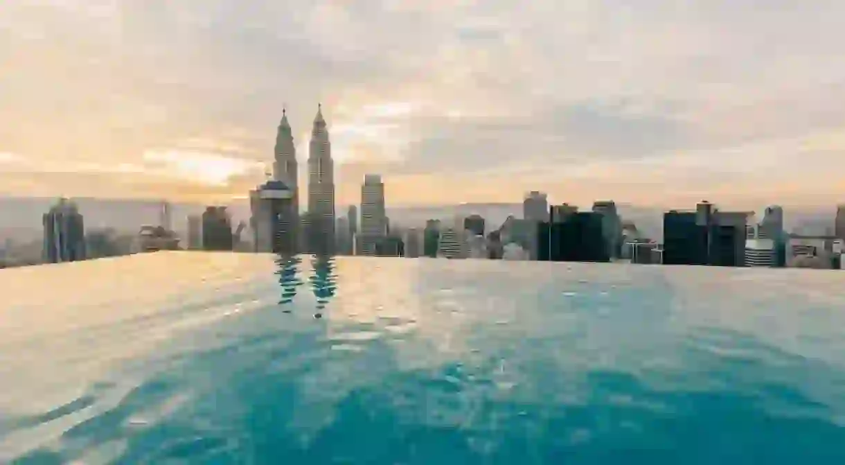 Petronas Twin Towers, Kuala Lumpur, can be seen from the rooftop infinity pool at The Face Suites