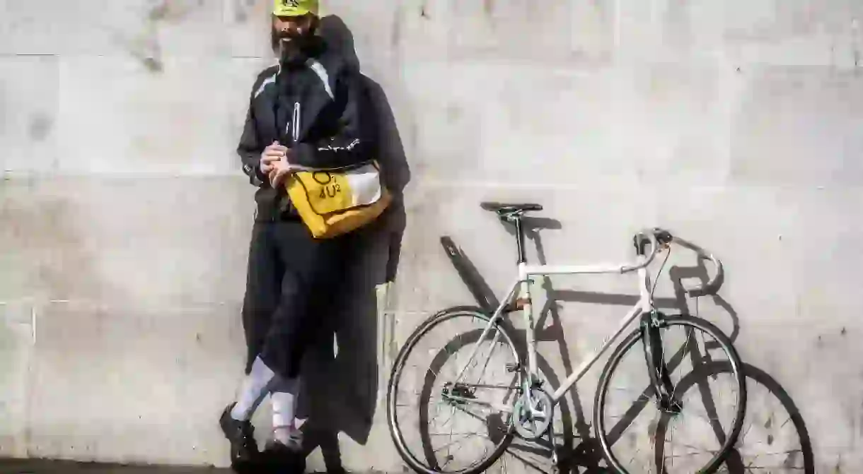 A bike courier takes a break