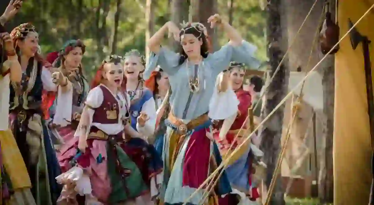 Dancers in traditional Romani costume at the Abbey Medieval Tournament