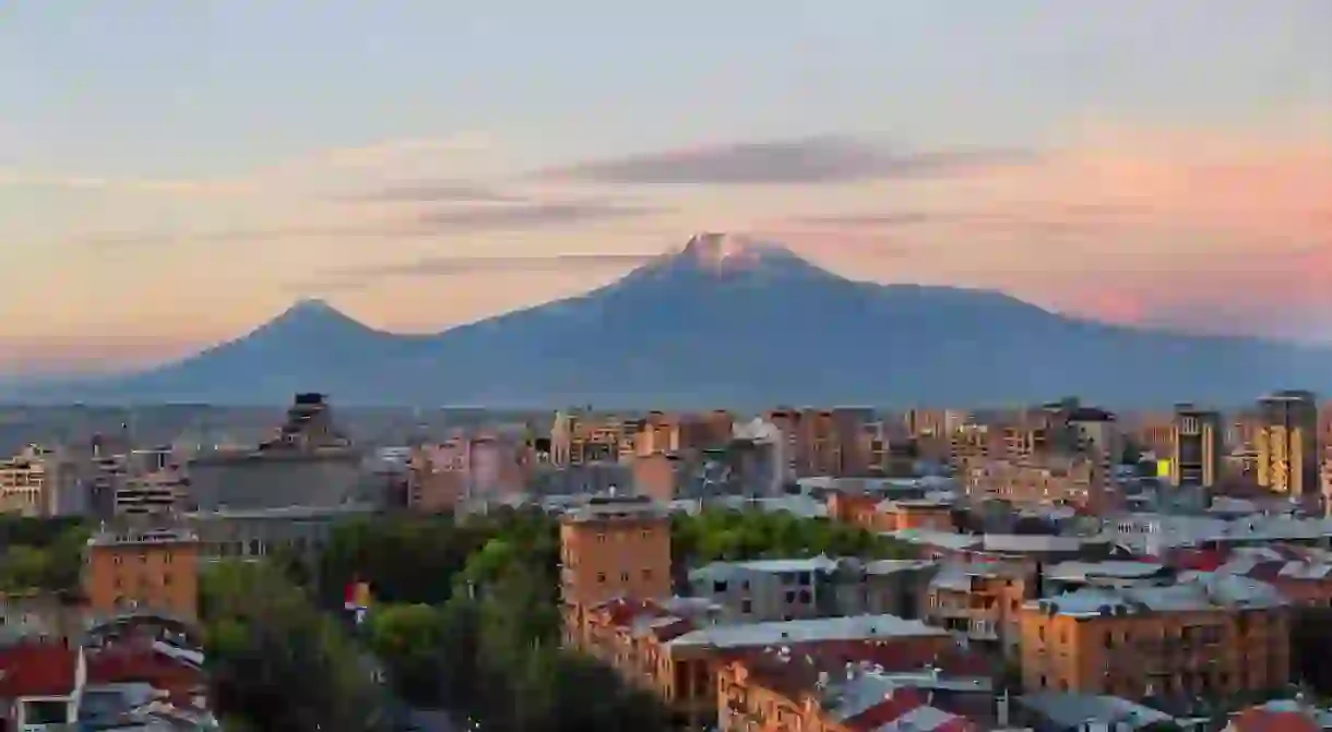 Yerevan at the sunrise with the two peaks of the Mt Ararat in the background, Armenia.