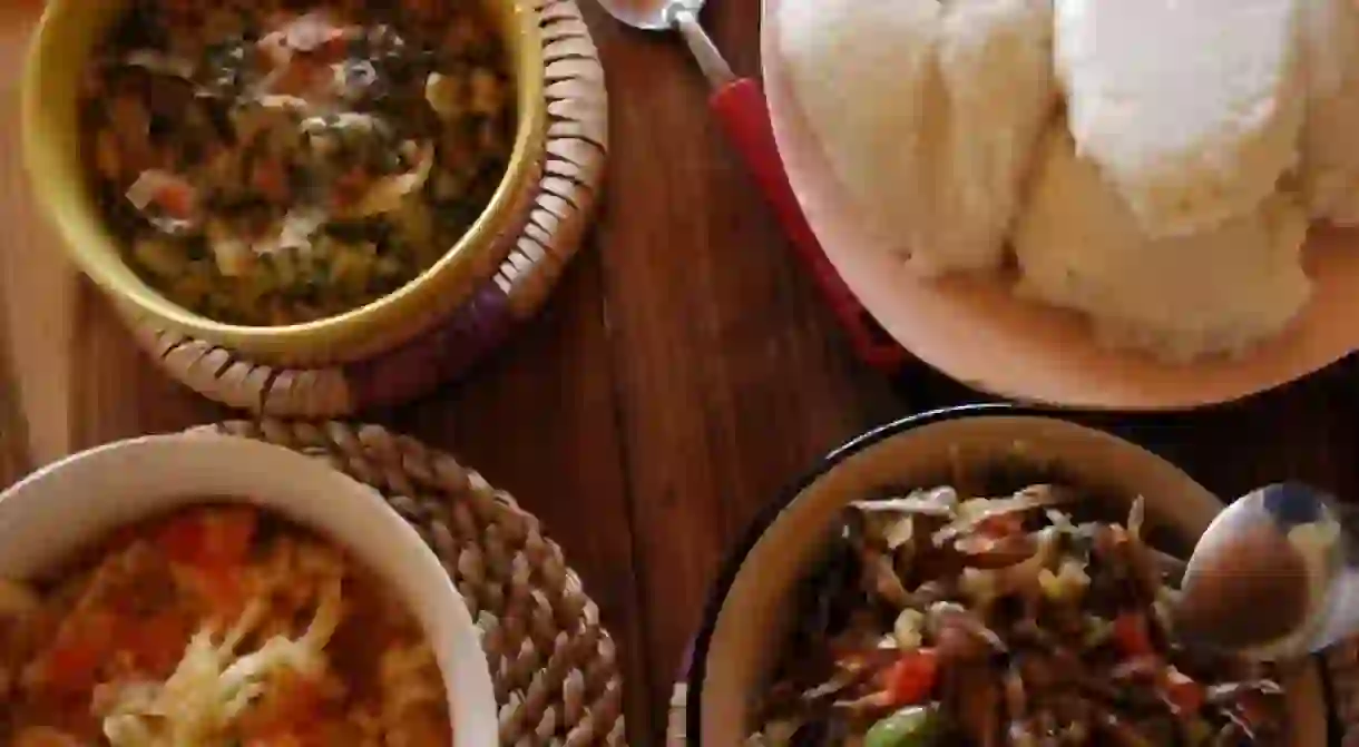 Nisima and three relishes is a popular and common dish in Zambia