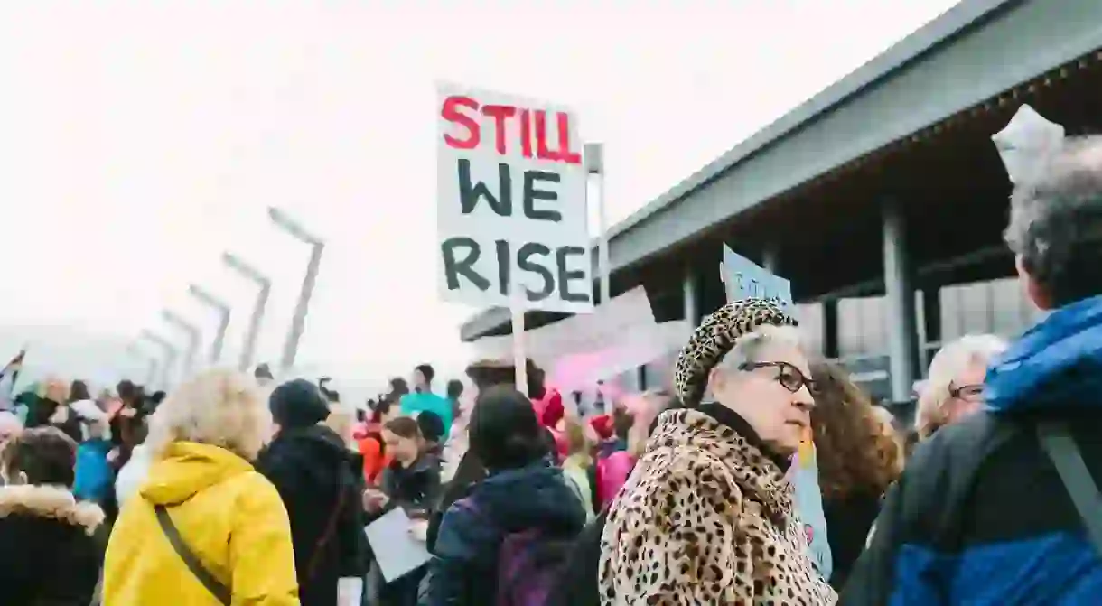 A Still We Rise protest sign at a demonstration