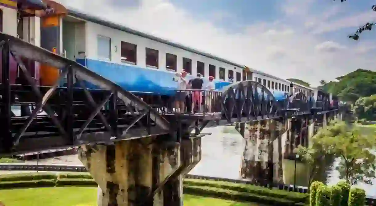 A local Thai train passes over the Bridge on the River Kwai