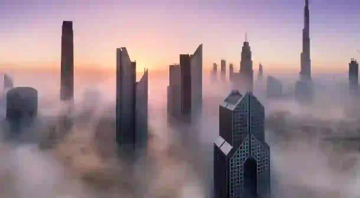 Dubai skyscrapers surrounded by the fog