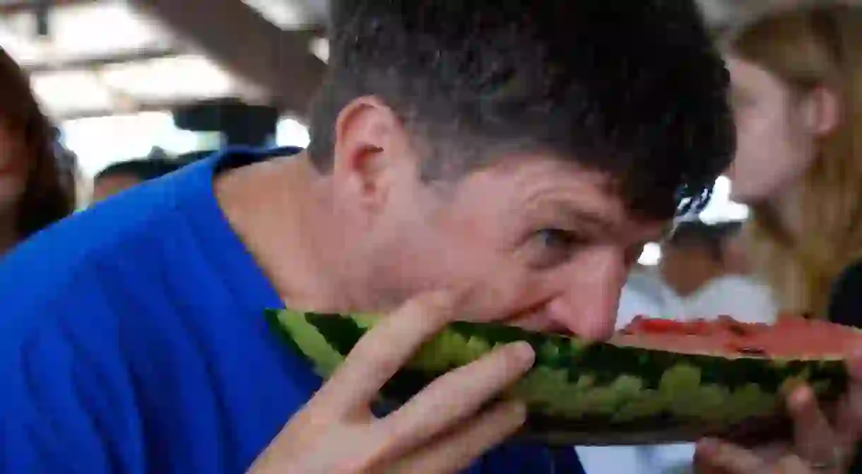 Folks come from near and far to feast on watermelon and spit seeds at the Watermelon Thump