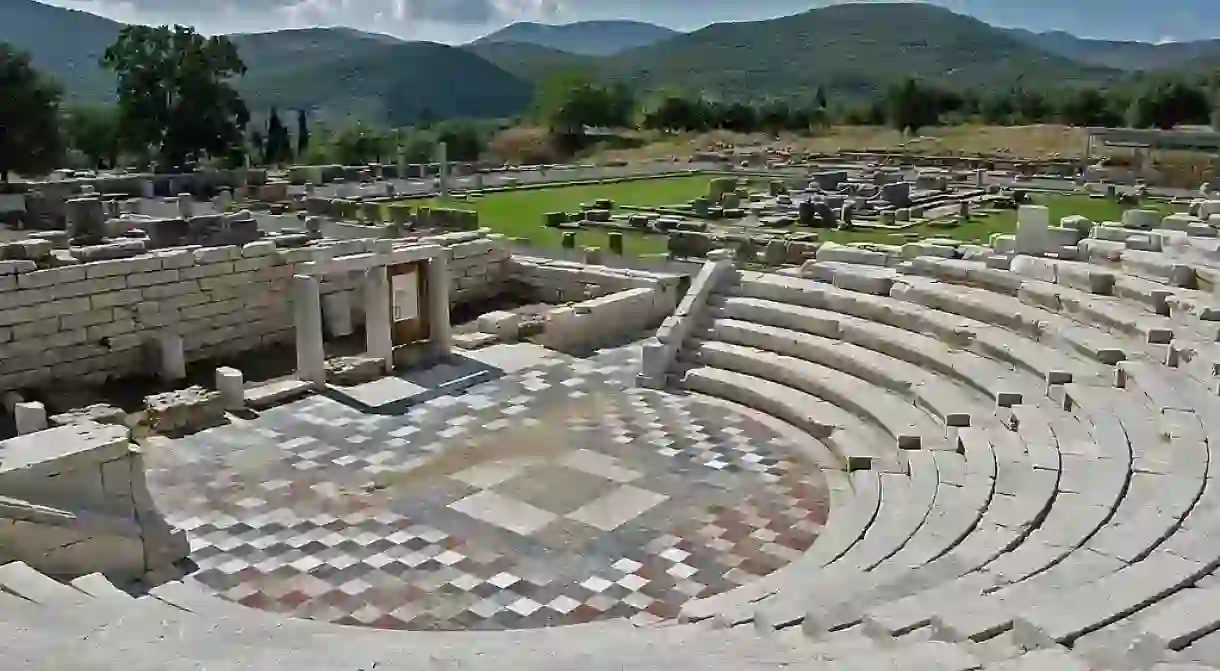 Ancient Messene, the Odeon, in the background the Agora with the Asklepieion can be seen