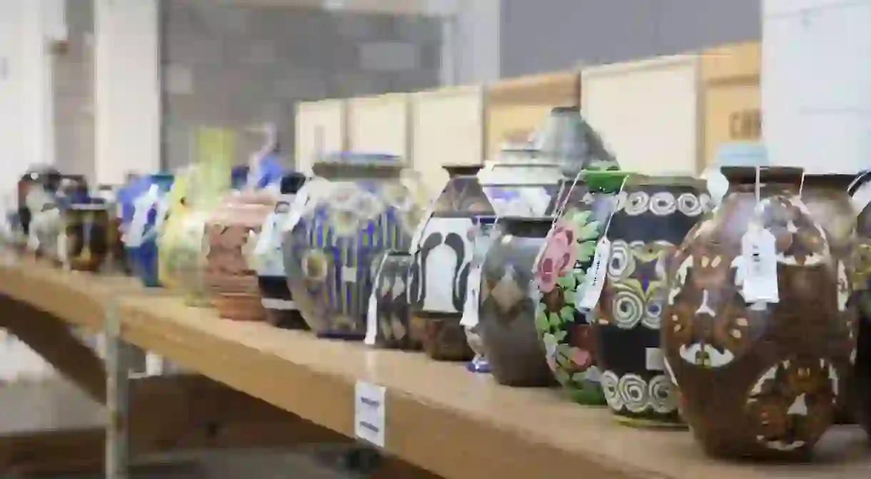 Rows of ceramic pots in Christies Redstone warehouse