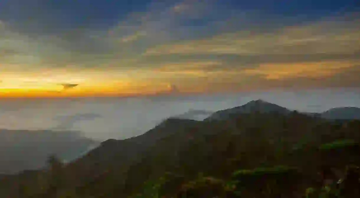 Sunrise view at the peak of Mount Tahan