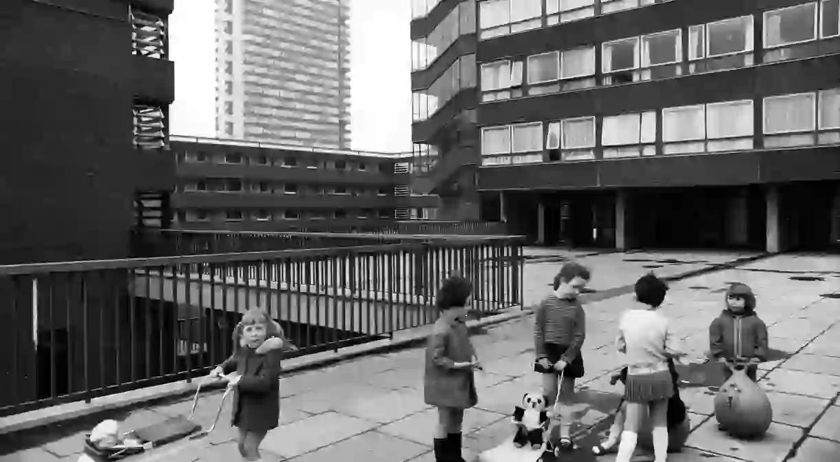 Pepys Estate, Deptford, London: children playing on a raised walkway, 1970