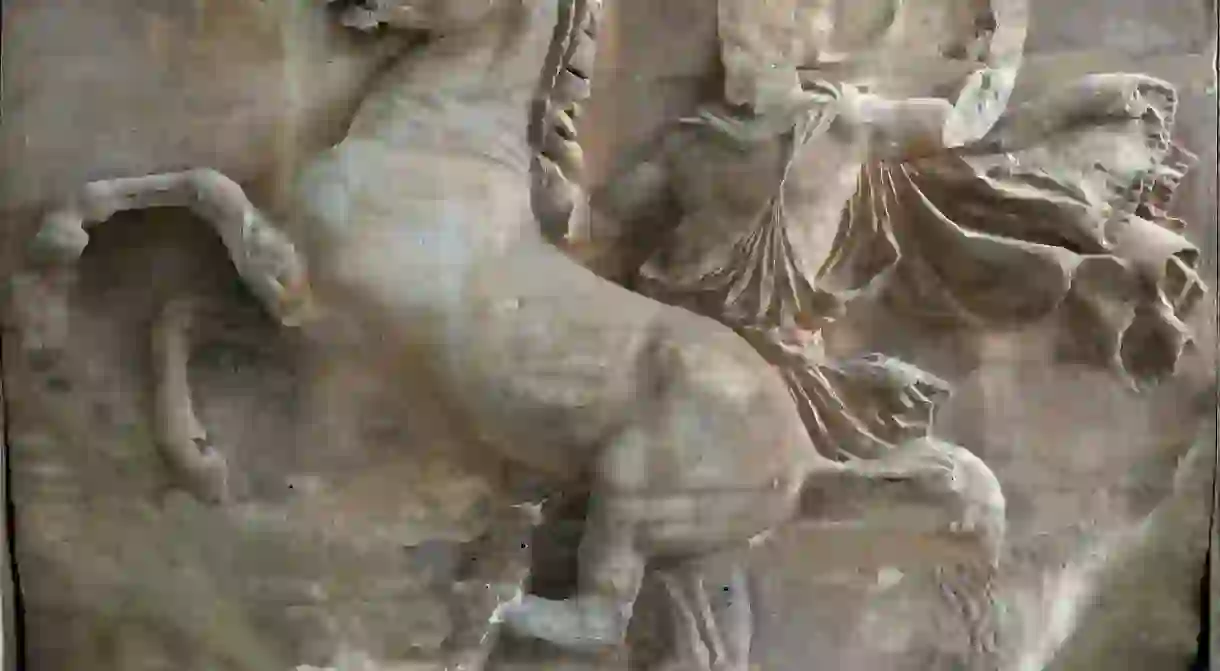 West frieze, Block VIII. A rider tries to restrain his unruly horse, pulling on the now-lost, metal reins.