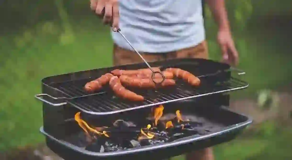 A man barbecuing