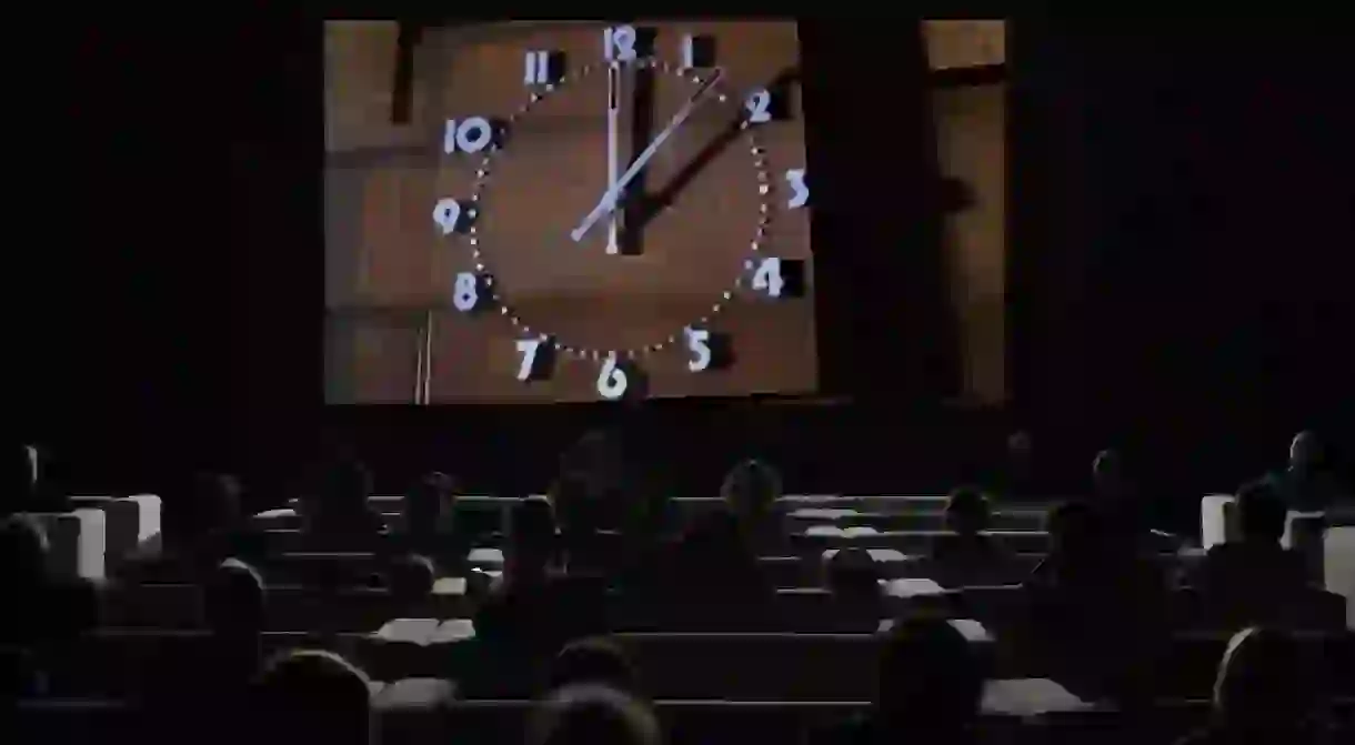 Installation view of ‘The Clock’ (2010) at Tate Modern, 2018