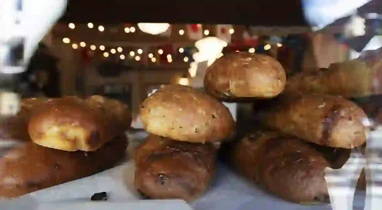 Peer through the bakerys window to view stacks of bread