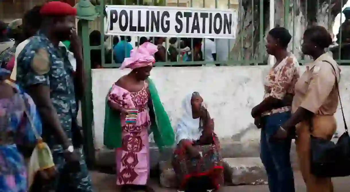 Gambians wait to cast their vote at a polling station in Banjul, The Gambia, December 2016.