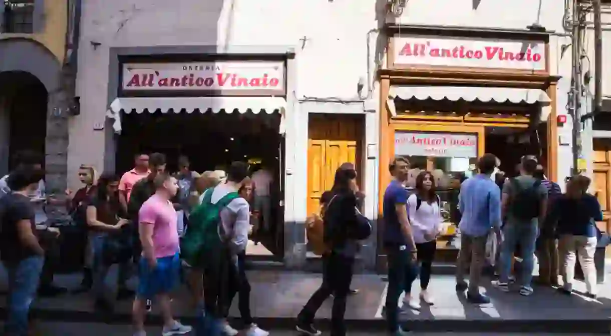 People queuing for one the famous paninis made by AllAntico Vinaio in Florence, Italy