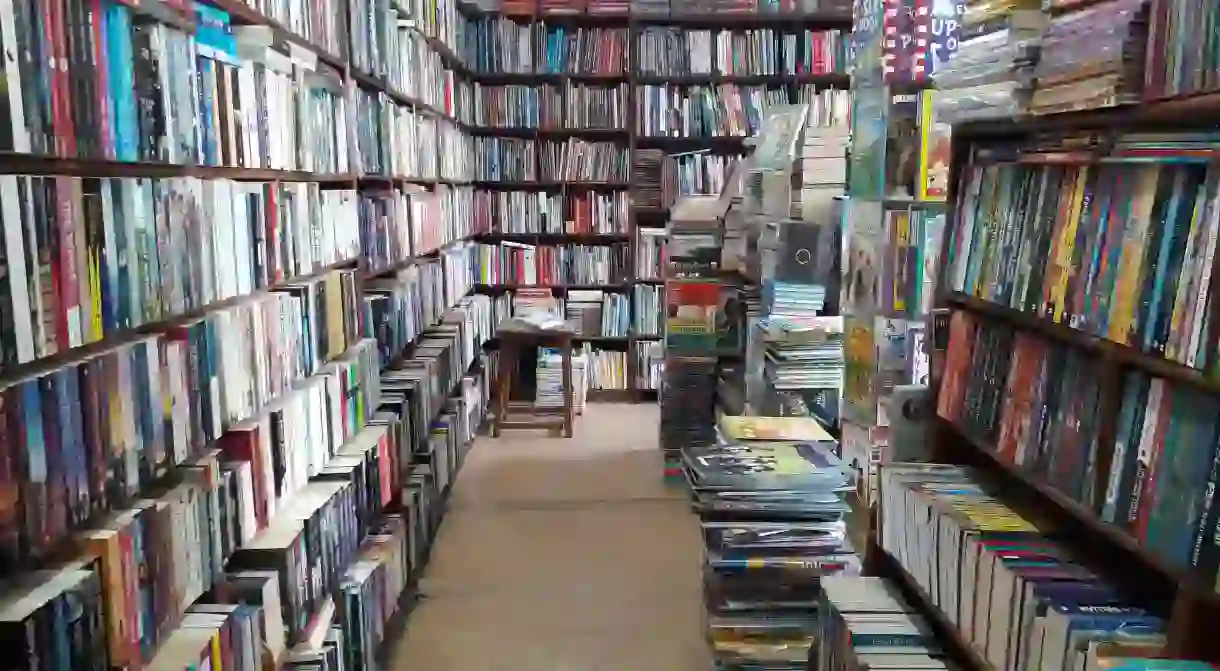 The Patan Bookshop welcomes visitors with floor-to-ceiling stacks