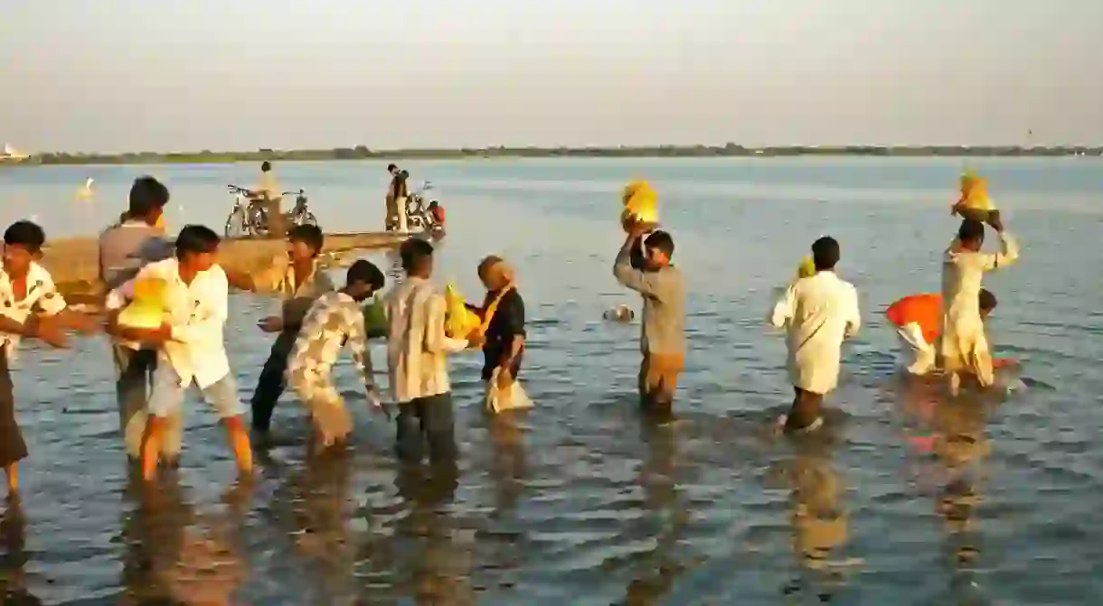 Rajasthani tribes performing Navaratri final day immersion, Rajkot, India.