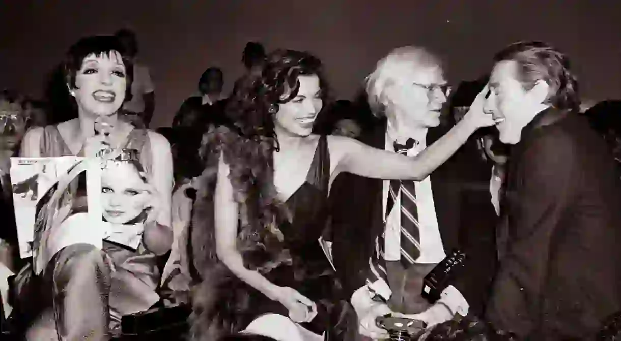 Liza Minnelli, Bianca Jagger, Andy Warhol, and Halston at Studio 54.