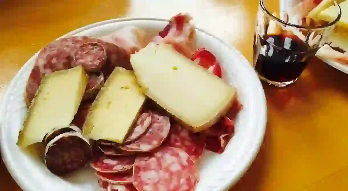 Traditional appetiser of local cheeses and cured meats at the Sagra di San Martino