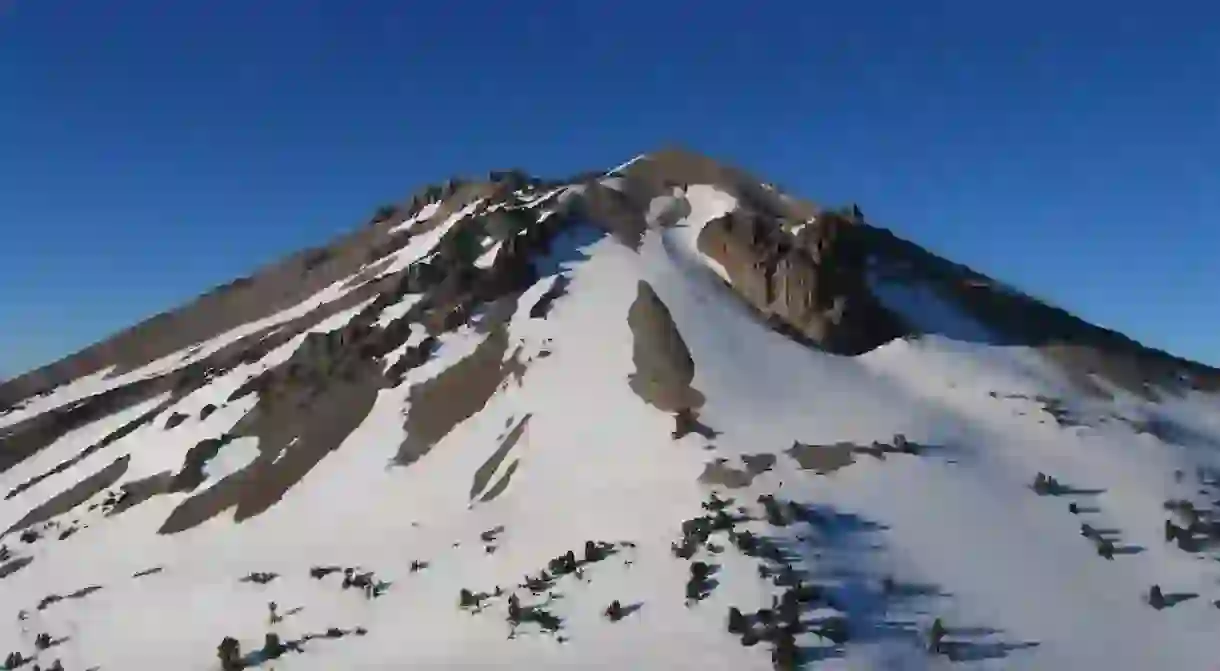 Lassen Peak anchors a range of plug dome volcanoes at the southern end of the Cascade Range