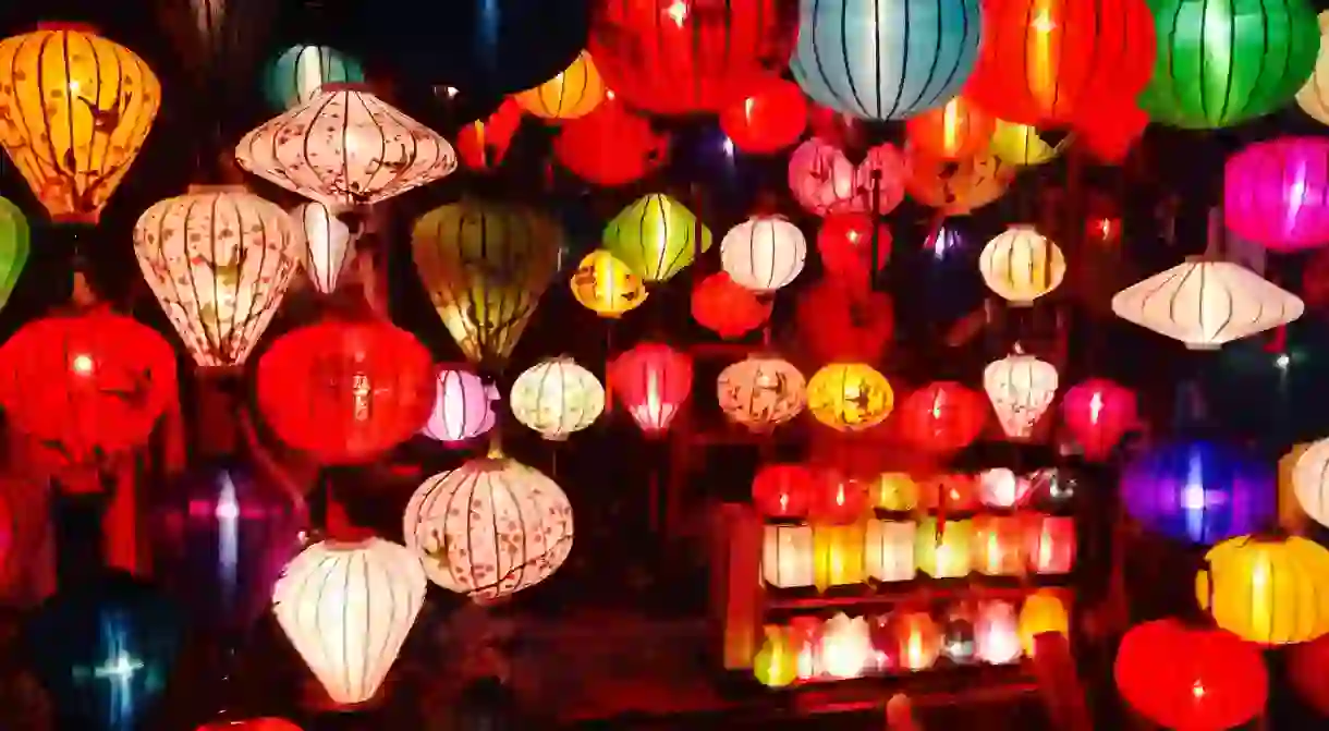 Colorful lanterns decorate an outdoor space