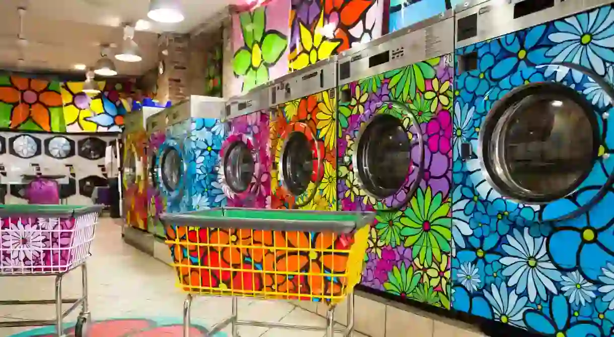 Unique, retro-painted washers and dryers in a local laundromat, New York City