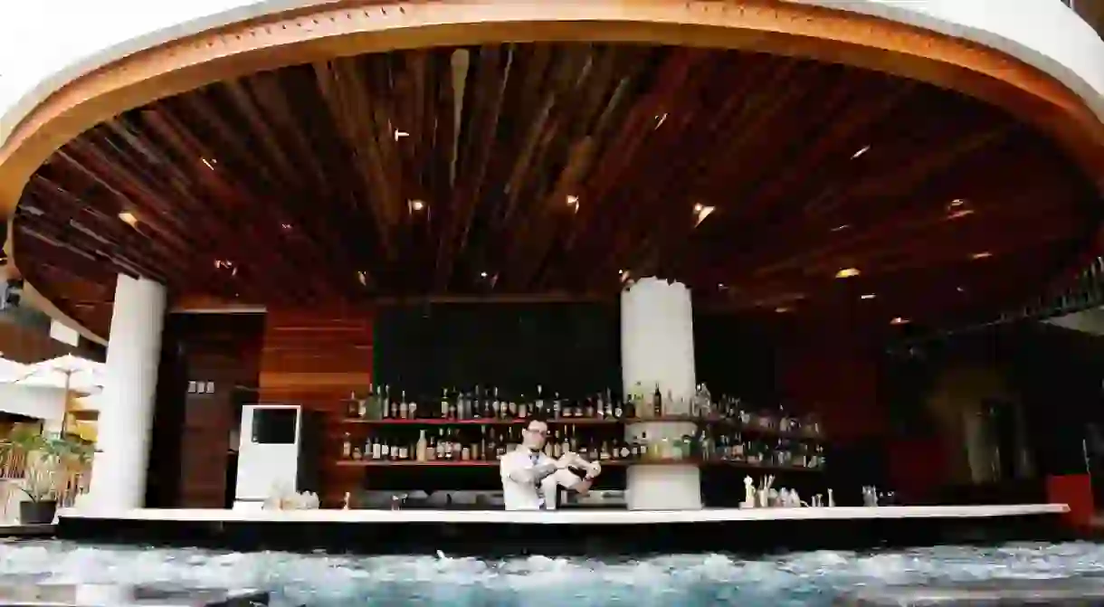 Sip cocktails at Prismas pool bar