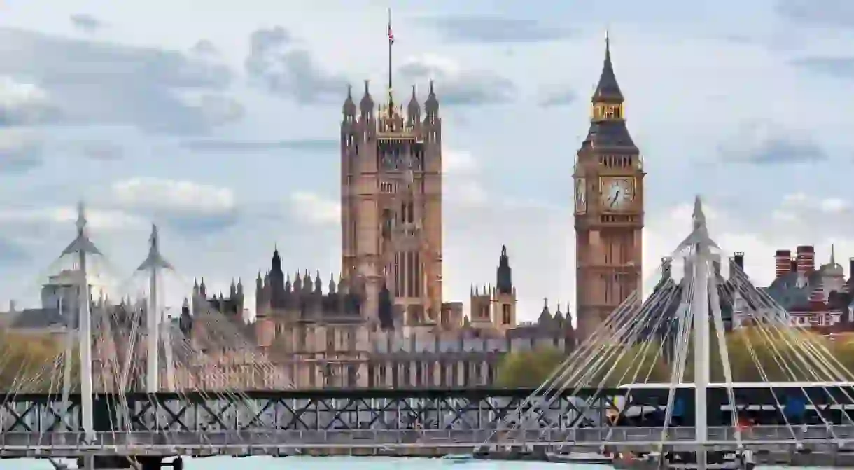 Big Ben and Victoria Tower of Houses of Parliament, London, UK