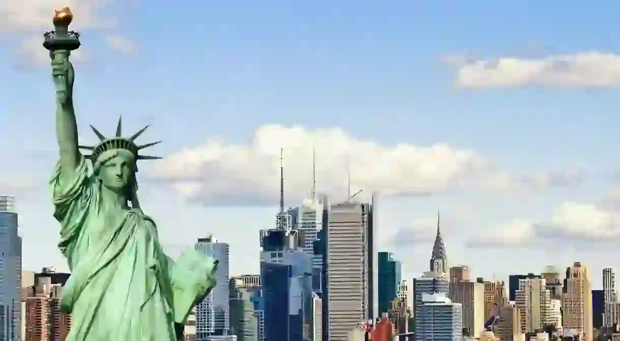 Statue of Liberty as seen against the New York City skyline.