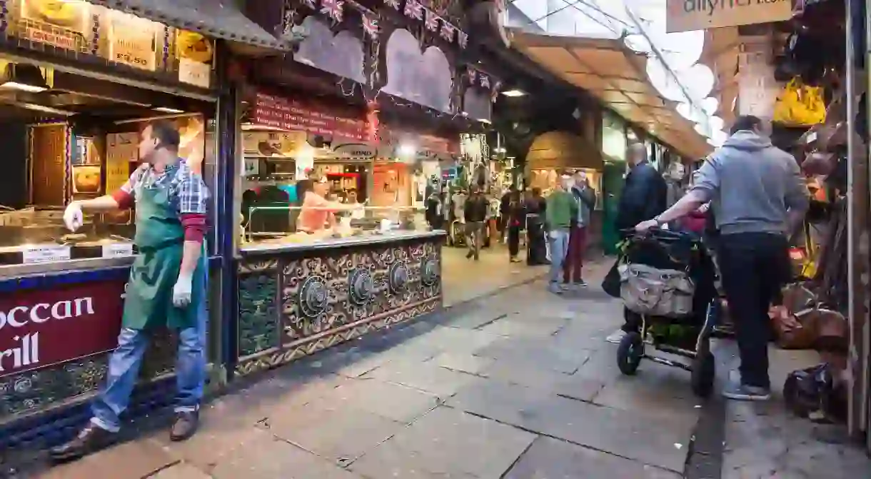 Visitors explore The Stables at Camden Market, London