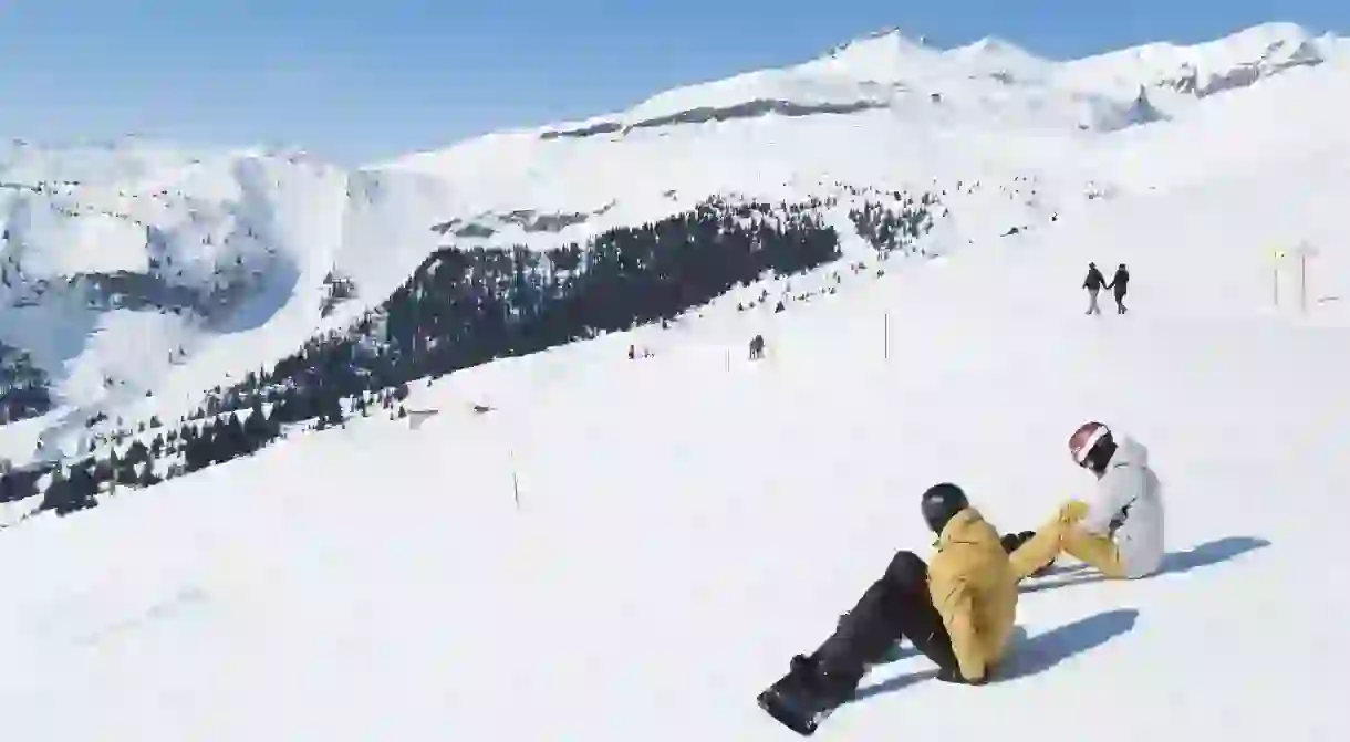 These snowboarders in Switzerland practically have the slopes to themselves