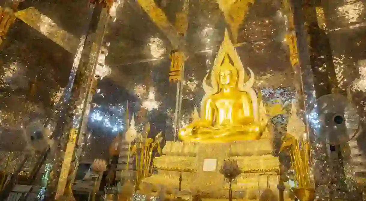 Golden Buddha statue inside Wat Chantaram (Wat thasung) temple.