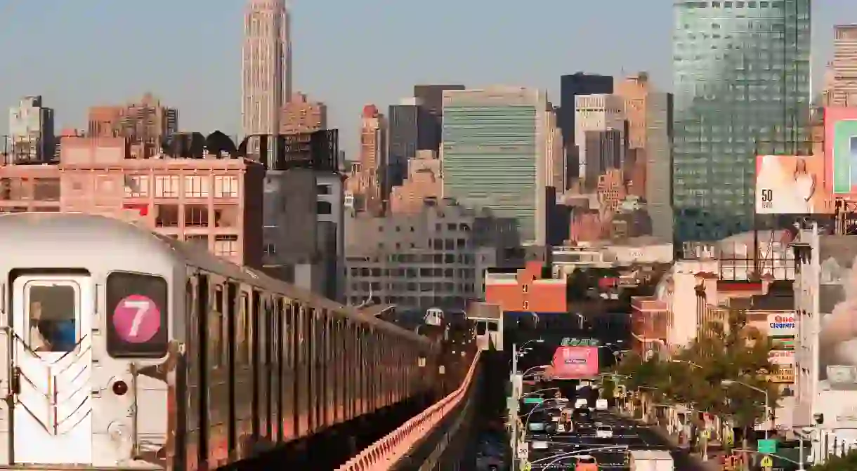 Subway train leaving Lowry Station in Sunnyside, Queens, New York