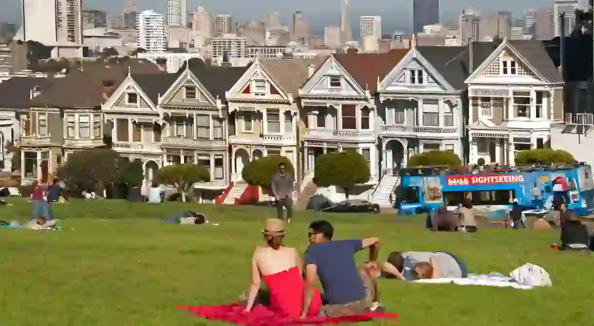 People relax in Alamo Square in Haight-Ashbury