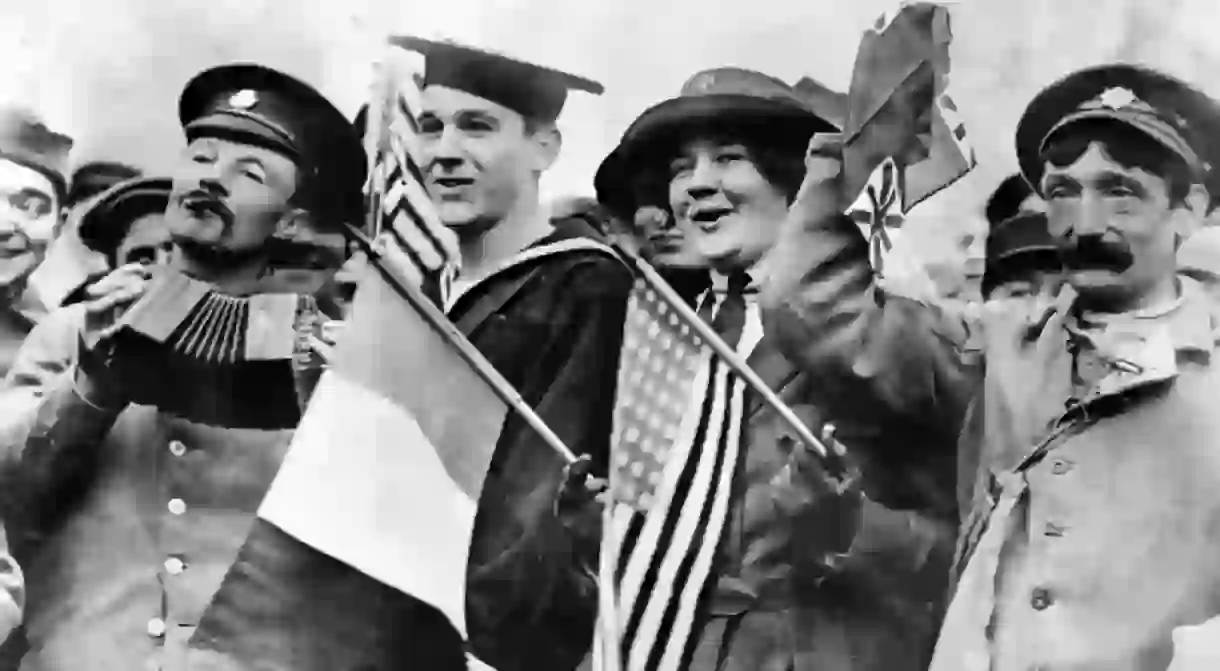 People in Paris celebrate the end of World War I on 11 November 1918